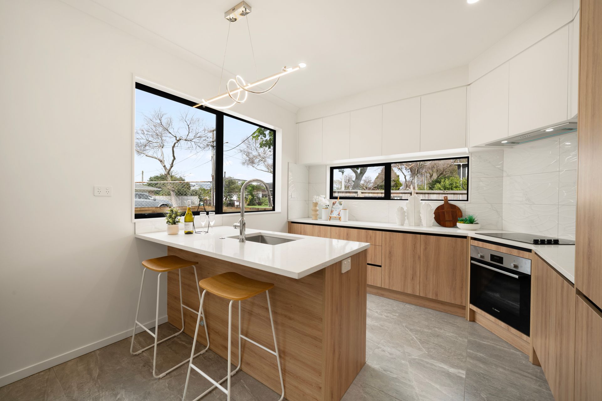 Kitchen with timber joinery and island bench