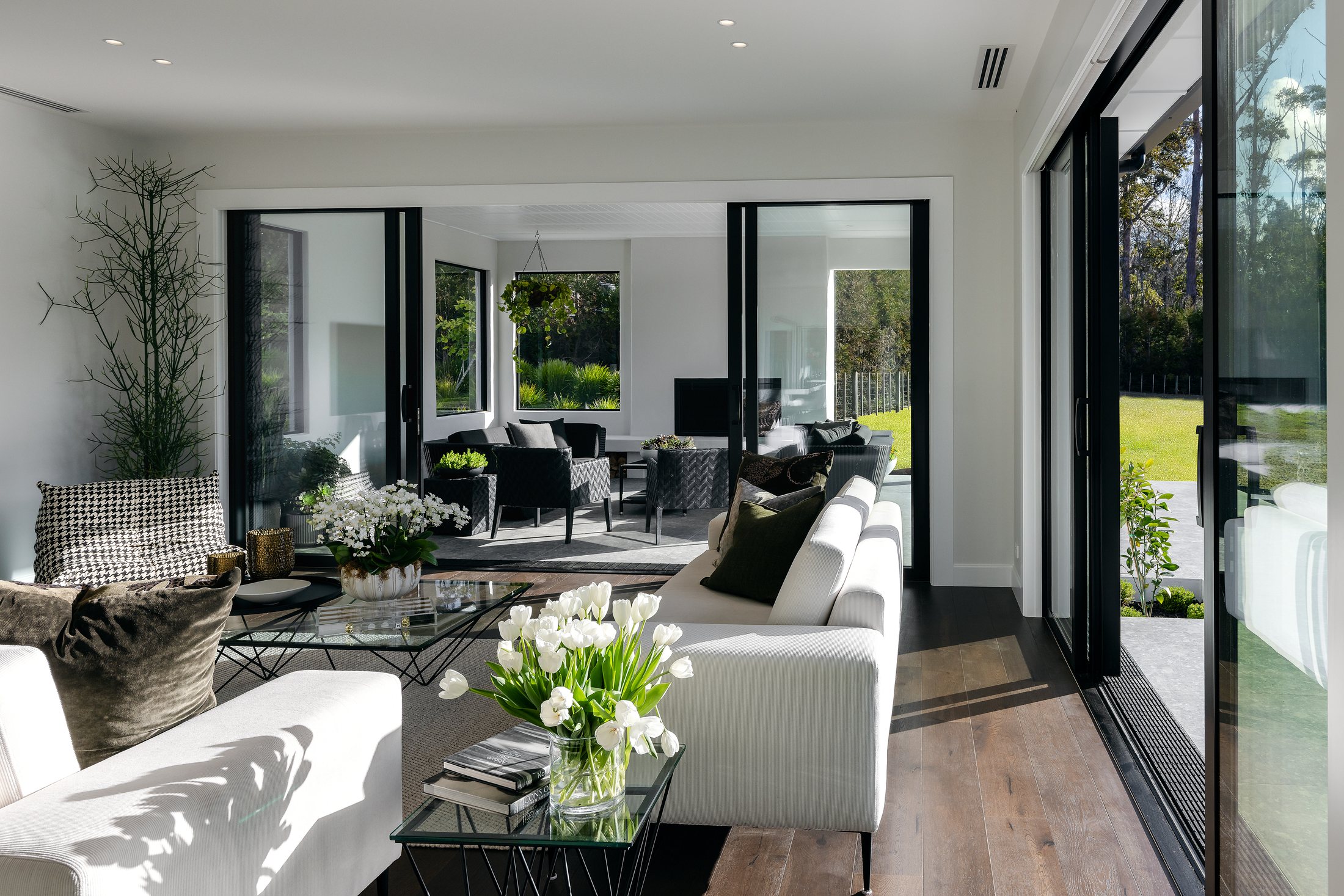 Sunlit living space opening to the landscape