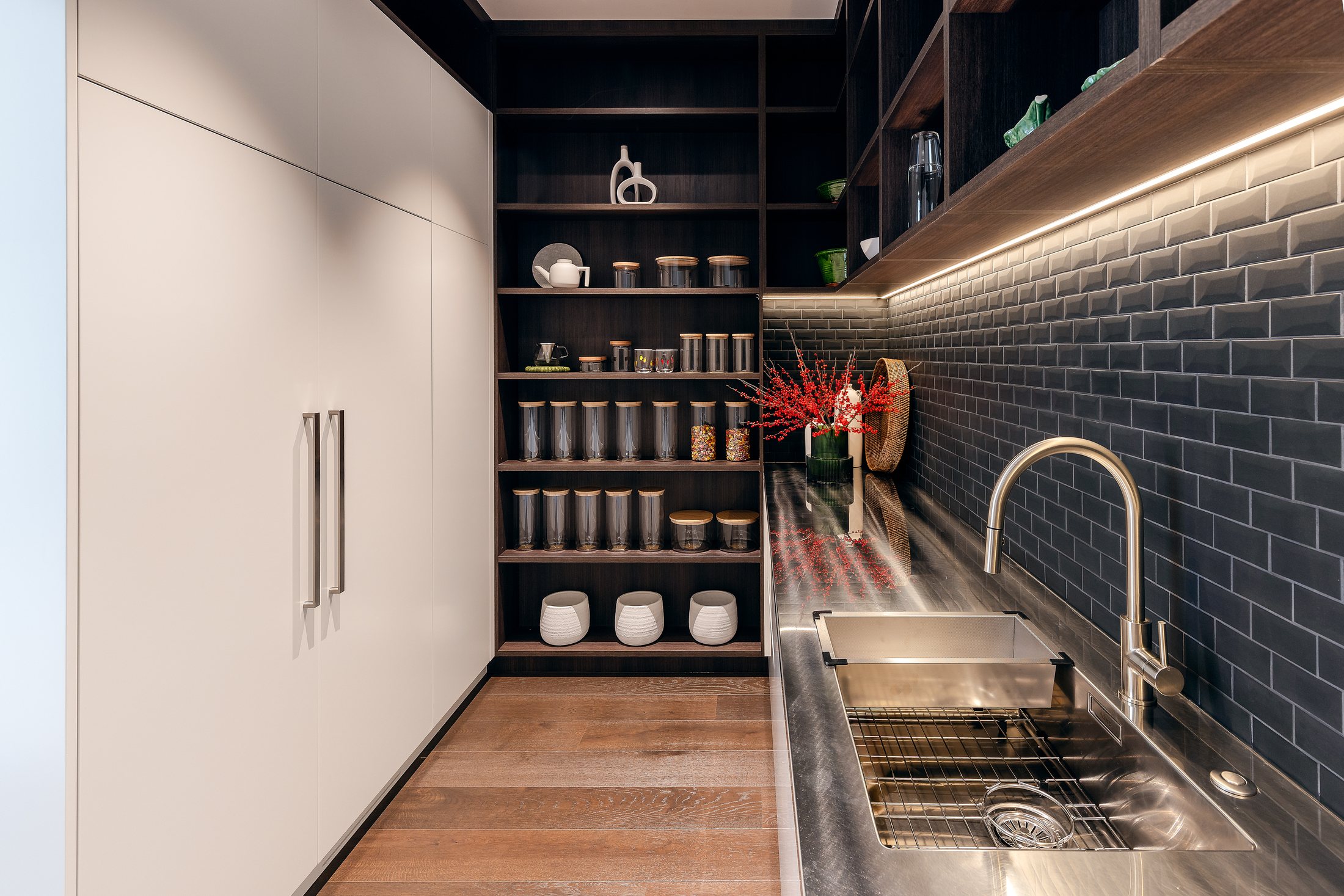 Scullery with dark tile and open shelves