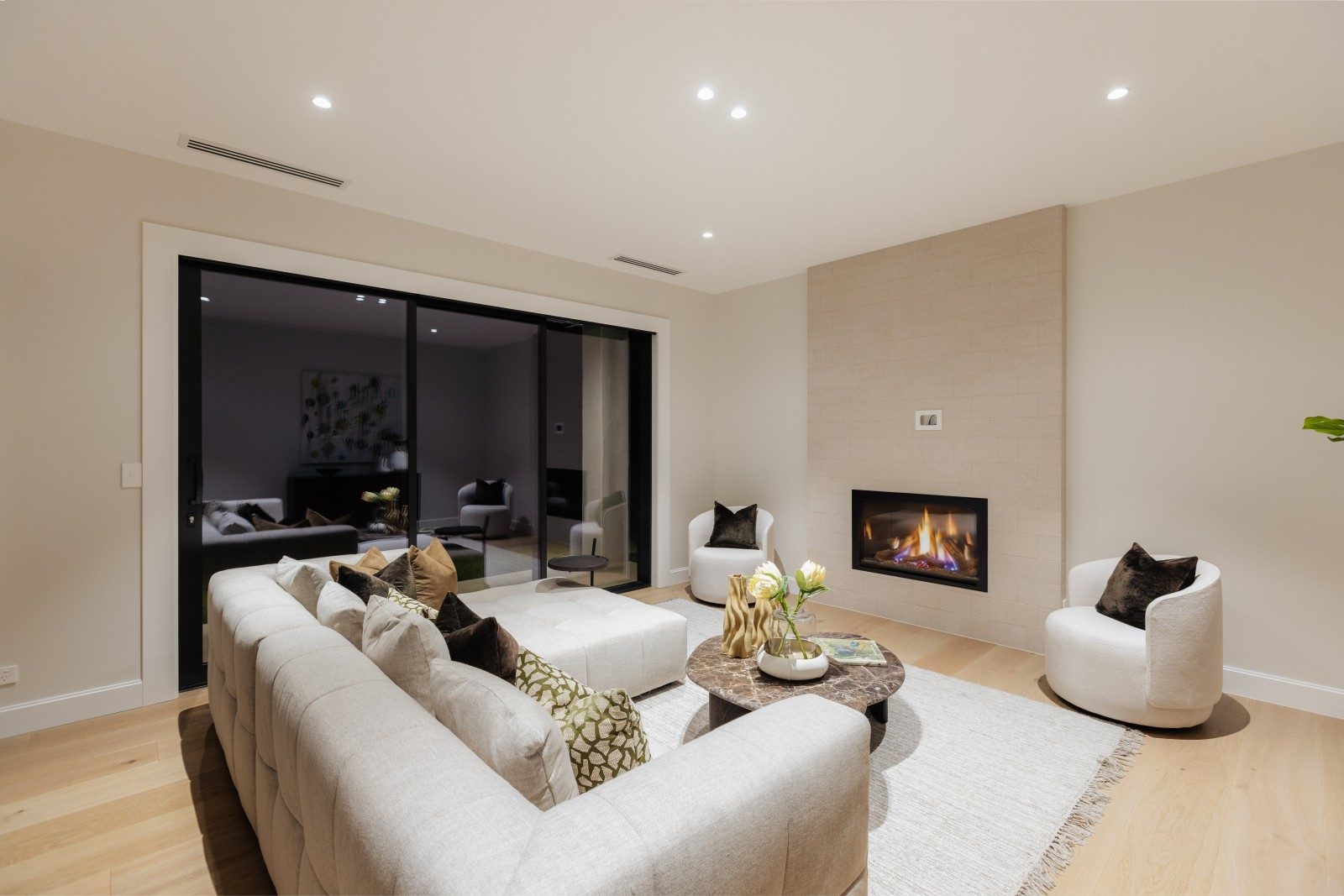Lounge and fireplace opening outdoors