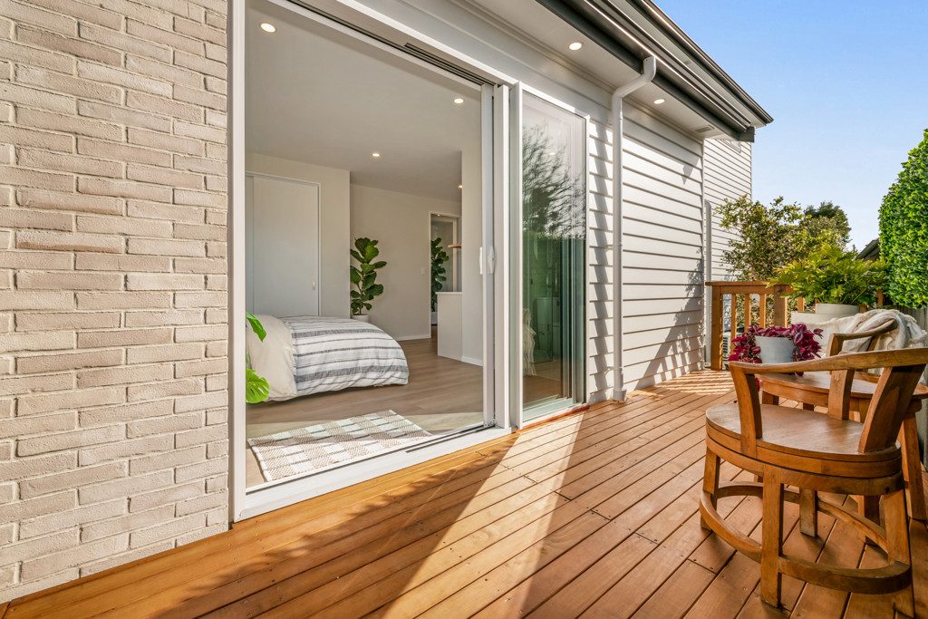 Bedroom opening directly to a private deck