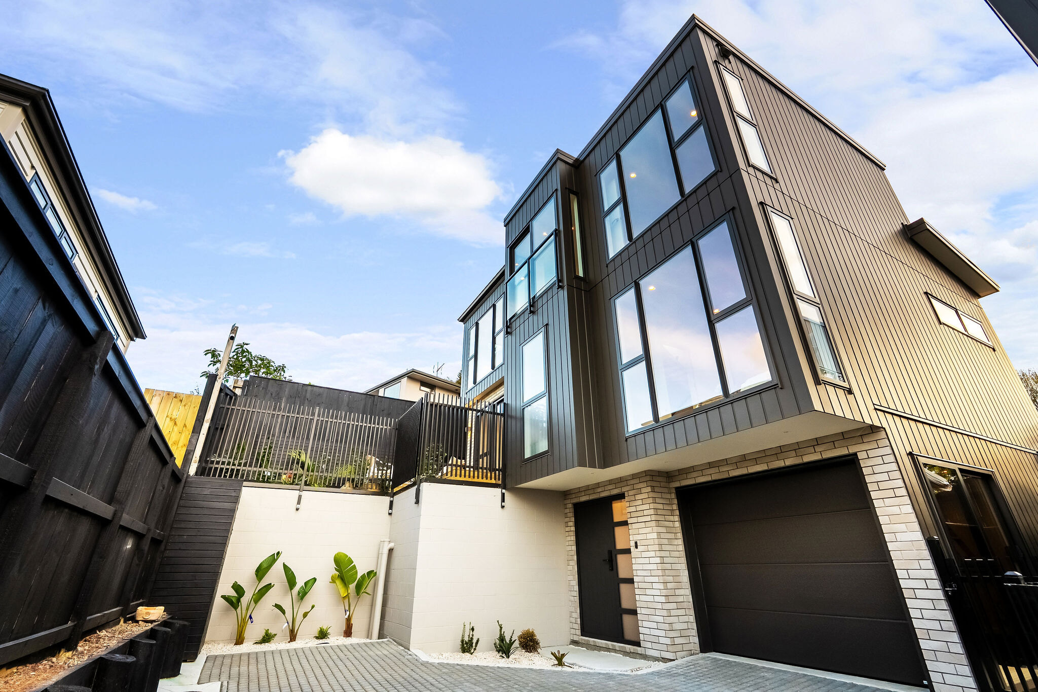 Elevated exterior view of a completed 10 Agathis Avenue home