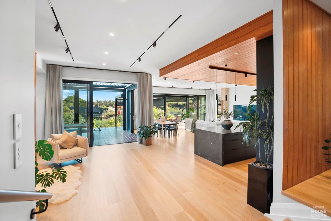 Light-filled interior looking toward the living and dining areas