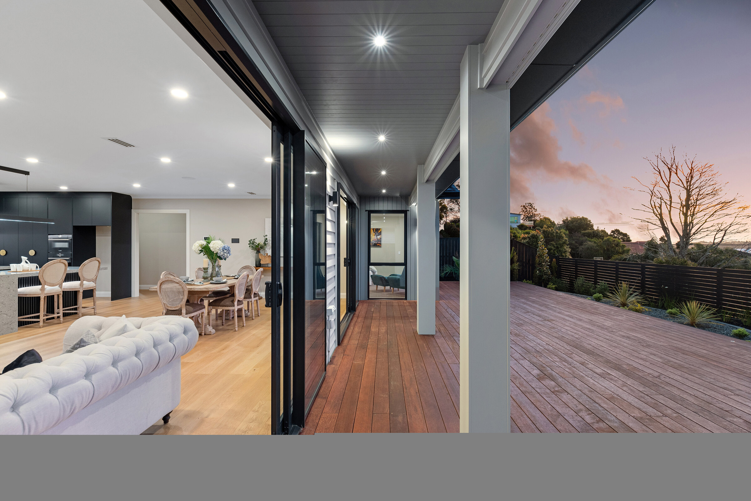 Covered deck and open-plan living at 56 Kewa Road