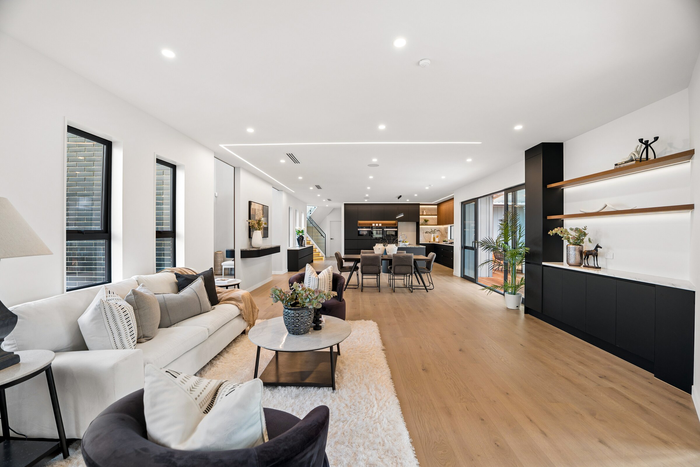 Open-plan living room at 73 Kewa Road