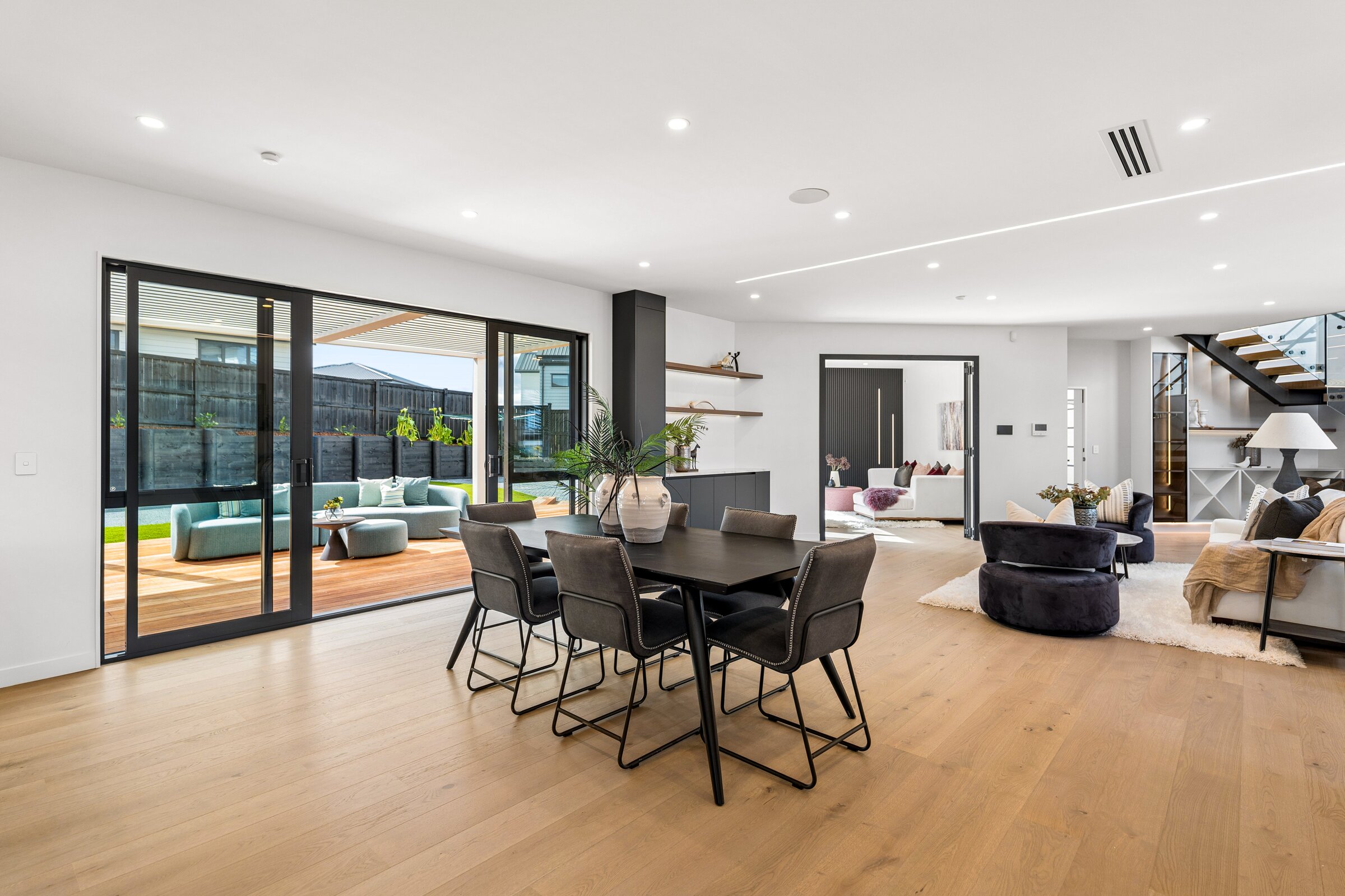 Dining and living area opening to the outdoor terrace