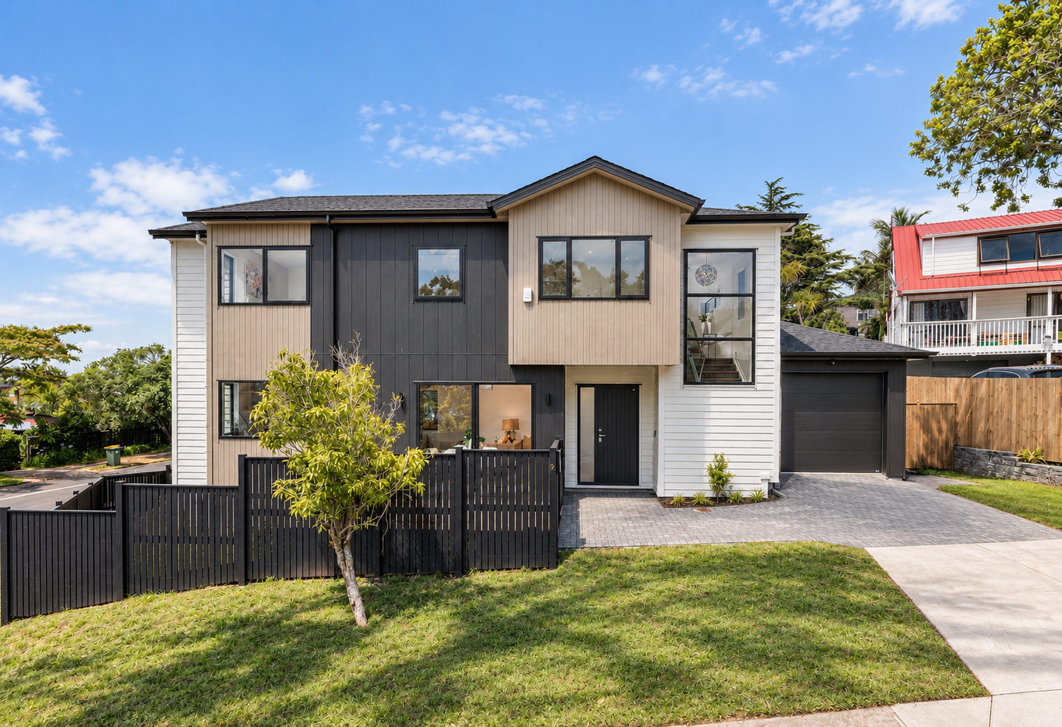 Street-facing view of the completed homes at 2 Lingham Crescent