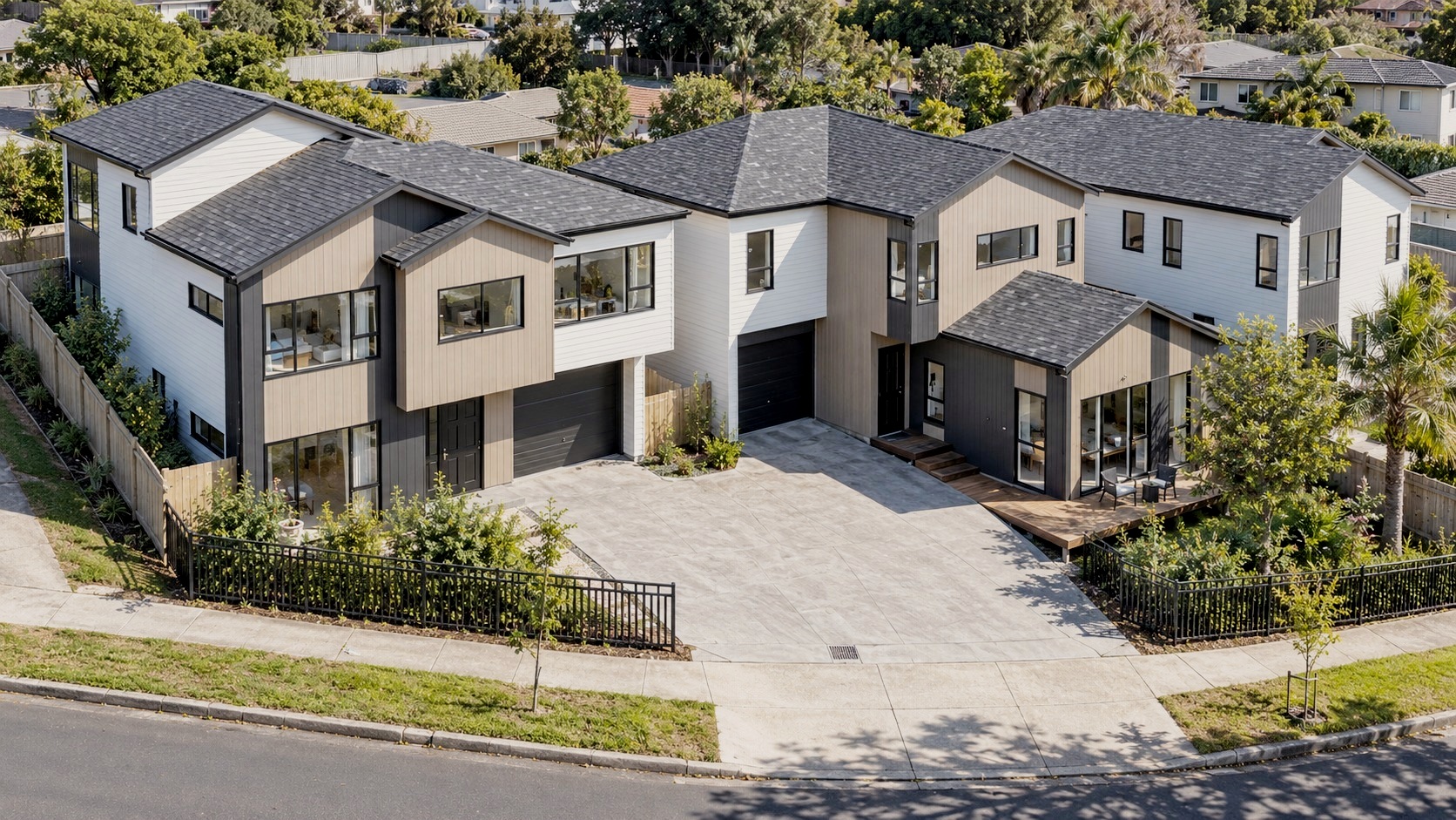 Aerial overview of the three-home development